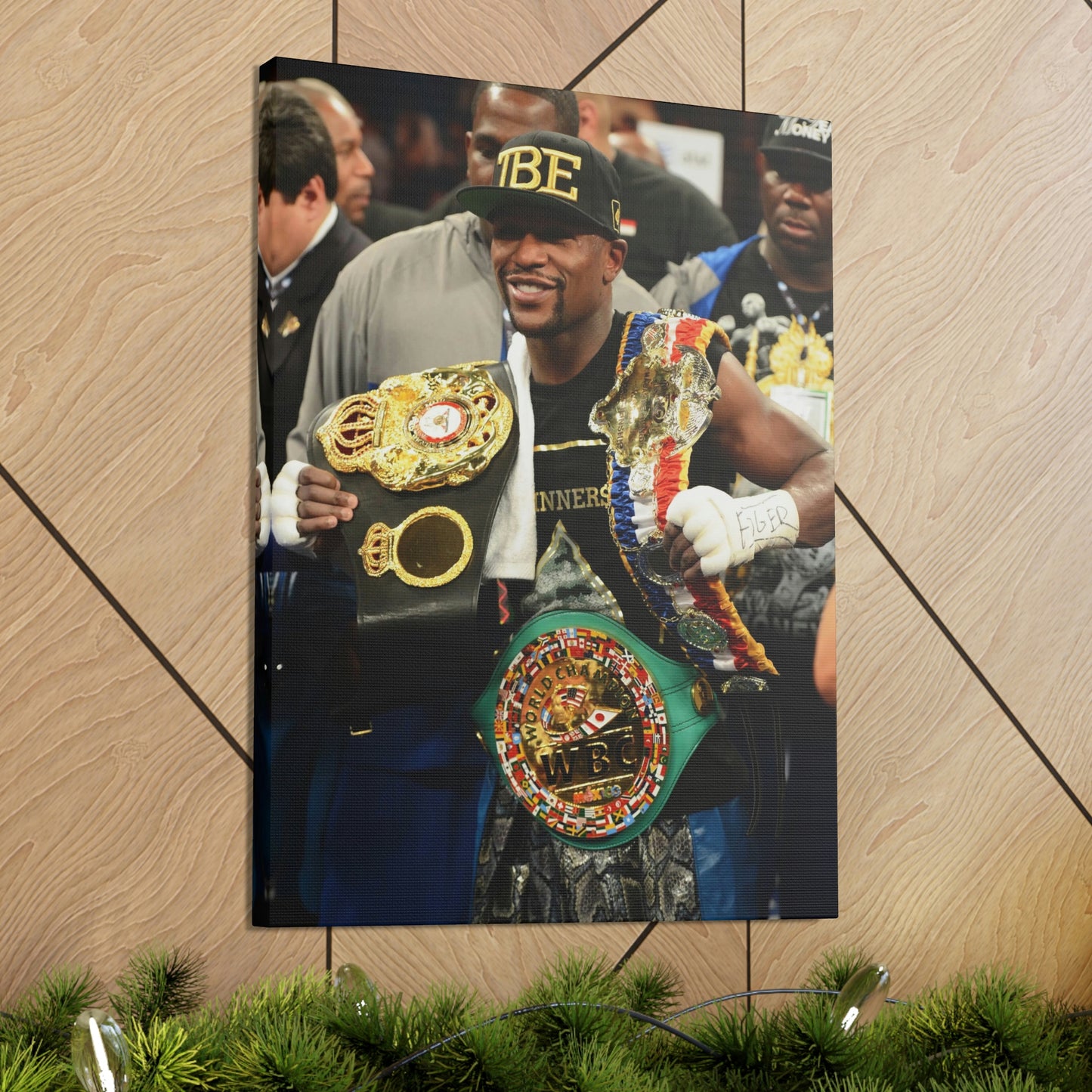 Floyd "Money" Mayweather Posing In The Ring With WBC, WBA, And The Ring Title Belts Canvas Wall Art